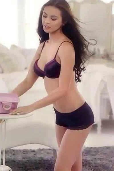 graceful Sam Pinto in her purple bikini