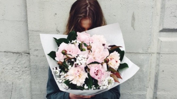 latin girl with flowers