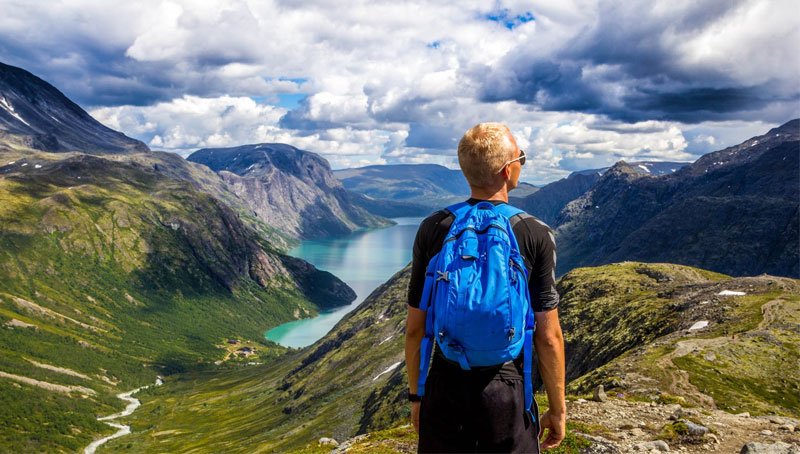 man-backpacking-on-the-mountains