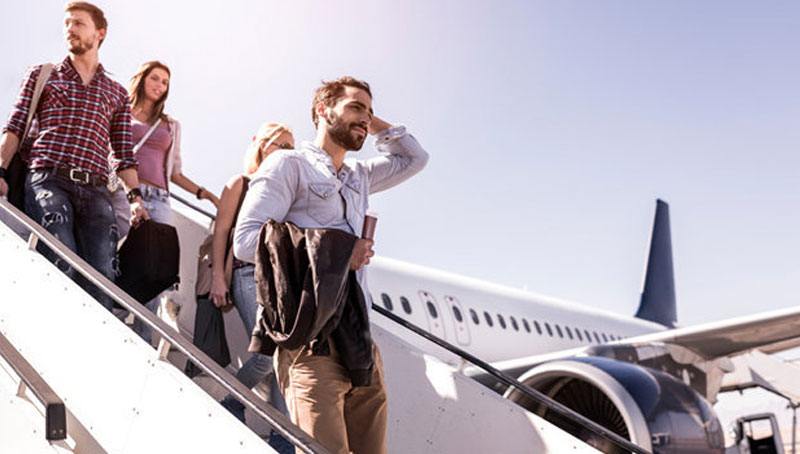 man getting off the plane