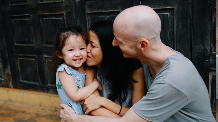 Vietnamese girl with her family