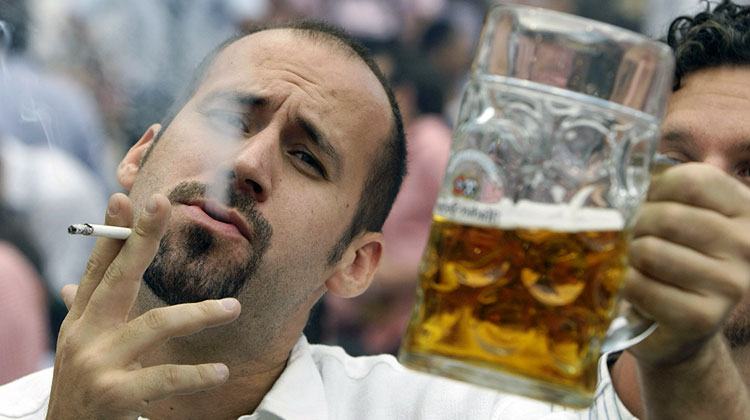 unattractive smoking and drinking Euro guy