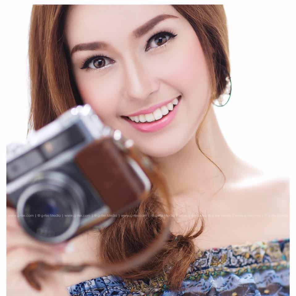 20+ Hottest Cambodian Women - View Pictures & Bios 35 Maiya Kager smiling holding a camera