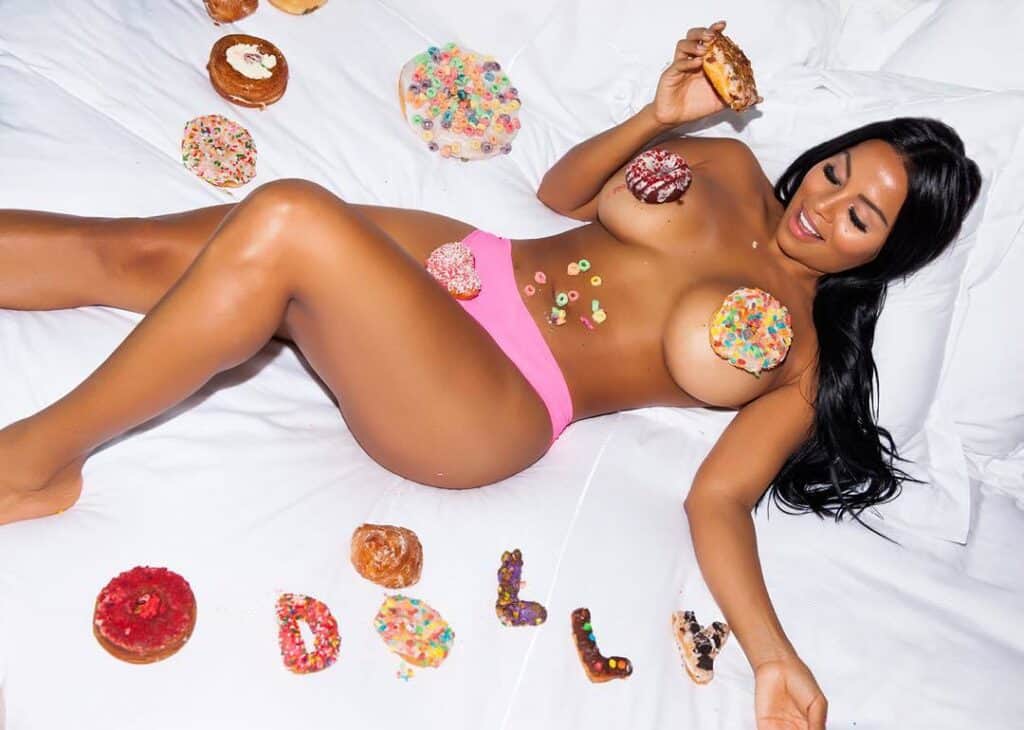 Top 20 Hottest Latin Women 24 Dolly Castro surrounded with donuts