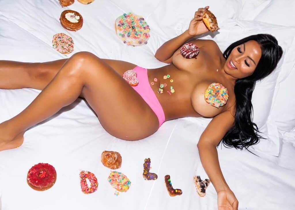 Dolly Castro surrounded with donuts